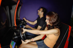Couple,In,A,Video,Game,Arcade,,Playing,Games